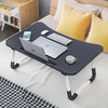 Foldable Black Laptop Table with Tablet Groove & Cup Holder – Multi-Use Desk for Work & Home     Ask ChatGPT NOVAPIK