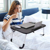 Foldable Black Laptop Table with Tablet Groove & Cup Holder – Multi-Use Desk for Work & Home     Ask ChatGPT NOVAPIK
